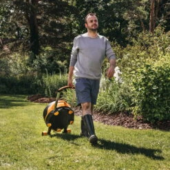 Fiskars Schlauchwagen Waterwheel Automatik XL, Für ½'-5/8", Schlauchdüse, Rasenspieß, Schwarz-orange -Stilvoller Gartenbedarfsladen 0930200501 Schlauchwagen Automatik XL mit Raedern 360 4 78977